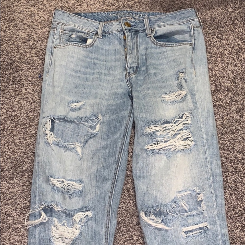 Extra distressed high rise mom jeans